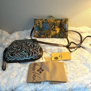 Patricia Nash purses. With paperwork and one bag.